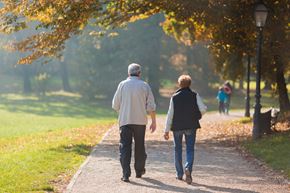 Lonaconing apartment for rent - an older couple walking down a path in a park