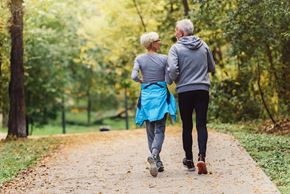 Vandalia apartment for rent - an older couple walking down a path in the park