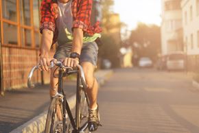 Silver Spring apartment for rent - a man riding a bike down a city street
