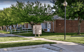 Upper Sandusky apartment for rent - a sign in front of a brick building