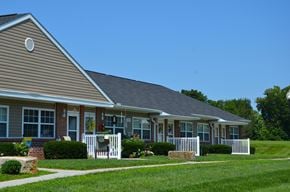 Waverly apartment for rent - a house with a porch and a lawn