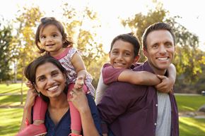Cross Lanes apartment for rent - a family posing for a picture in a park