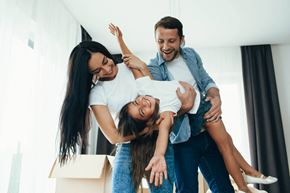Lincoln apartment for rent - a group of people in a living room with boxes