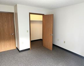 Lonaconing apartment for rent - an empty room with two doors and a closet