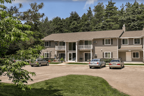Saugatuck apartment for rent - a large house with cars parked in front of it