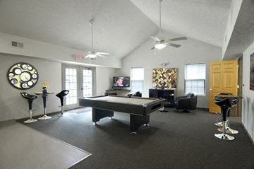 Urbana apartment for rent - a living room with a pool table and a tv