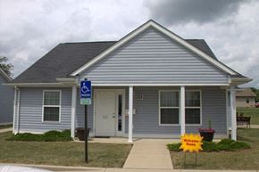 West Union apartment for rent - a blue house with a handicapped sign in front of it
