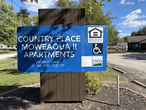 Moweaqua apartment for rent - a sign that reads country place apartments