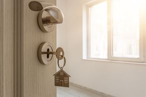 Cross Lanes apartment for rent - a door knob with a house shaped keychain on the door