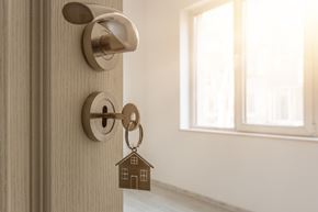 Lincoln apartment for rent - a door knob with a house shaped keychain on the door