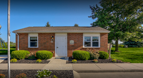 Dunkirk apartment for rent - the front of a brick house with a white door