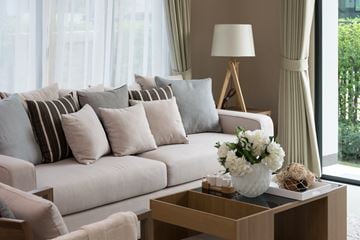 Peebles apartment for rent - a living room with a white couch and a coffee table