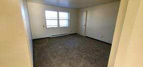 Leroy, Genesee County apartment for rent - an empty room with a window and a door