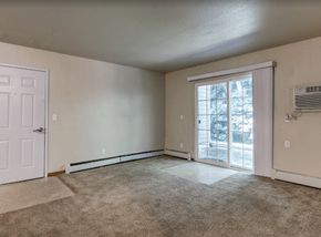 Saugatuck apartment for rent - an empty living room with a door to a patio