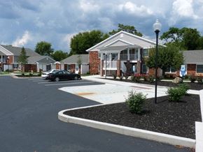 Belpre apartment for rent - an empty parking lot in front of a house