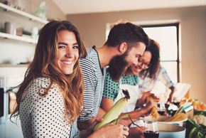 Monmouth apartment for rent - a group of people in a kitchen preparing food