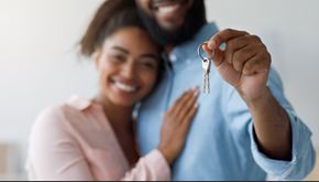 Fowlerville apartment for rent - a man and woman holding a key to a house