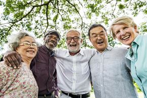 Leroy, Genesee County apartment for rent - a group of people posing for a photo under a tree