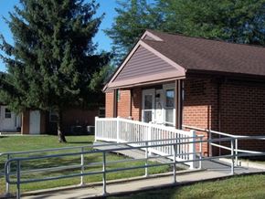 Galion apartment for rent - a small red brick building with a white porch