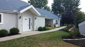 Bethesda apartment for rent - a white house with a sidewalk in front of it