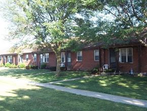 Galion apartment for rent - a red brick house with a sidewalk in front of it