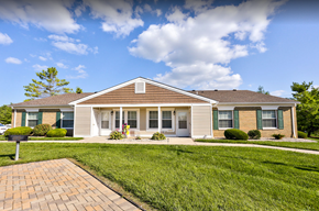 Greenville apartment for rent - a house with a lawn and a walkway in front of it