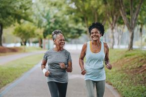 Freeport apartment for rent - Two women jogging on a path in a park.