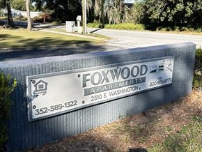 Eustis apartment for rent - A sign for Foxwood Apartments in Washington.