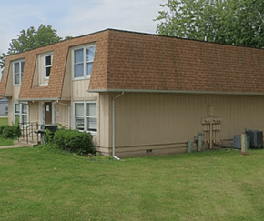 Taylorville apartment for rent - a house with a yard in front of it
