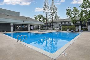 San Bernardino apartment for rent - A large swimming pool in a residential area.