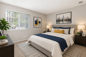 Lancaster apartment for rent - A bedroom with a large bed and a cityscape picture on the wall.