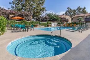 Visalia apartment for rent - A small round pool with a metal ladder.