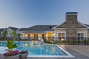 West Long Branch apartment for rent - A house with a pool in front of it.