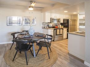 Santa Maria apartment for rent - A modern dining room with a round table and chairs.
