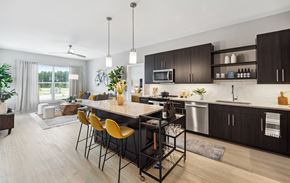Summerville apartment for rent - A modern kitchen with a dining table and chairs.