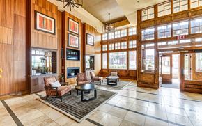 Kansas City apartment for rent - A living room with a fireplace and a TV.