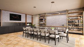 Parsippany apartment for rent - A dining room with a long table and chairs.