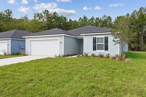 Jacksonville apartment for rent - A house with a grey roof and a white garage door.