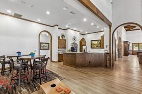 Fort Worth apartment for rent - A dining room with a wooden table and chairs.
