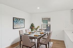 Mckinney apartment for rent - A dining room with a table set for six people.