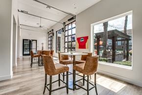 Houston apartment for rent - Clubroom with Garage Door Windows  Leading to the Pool.