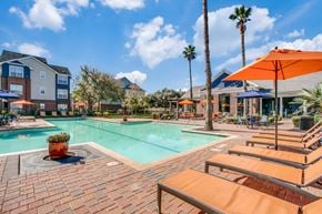 Houston apartment for rent - Aventura on Briar Forest 14515 Briar Forest Dr, Houston, TX 77077  Pool Area with lounge chairs