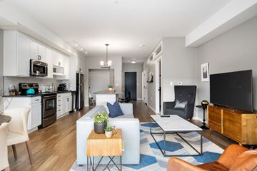 St Paul apartment for rent - a living room with a couch and a table