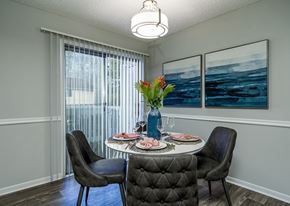 Marietta apartment for rent - a dining room with a table and chairs and a window