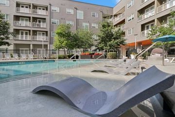 Kansas City apartment for rent - A large metal sculpture sits in the middle of a pool.