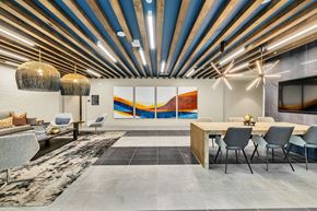 Arlington apartment for rent - A modern dining room with a wooden table and chairs.