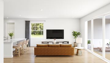 Riverview apartment for rent - A living room with a brown couch and a television.
