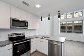 Washington apartment for rent - a view of a glass table with a black and white reflection