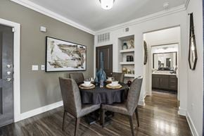 Fort Worth apartment for rent - A dining room with a table set for two.