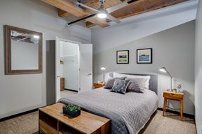 St Paul apartment for rent - Loft style bedroom with exposed wood ceilings and walk-in closet C&E Living in St Paul, MN
